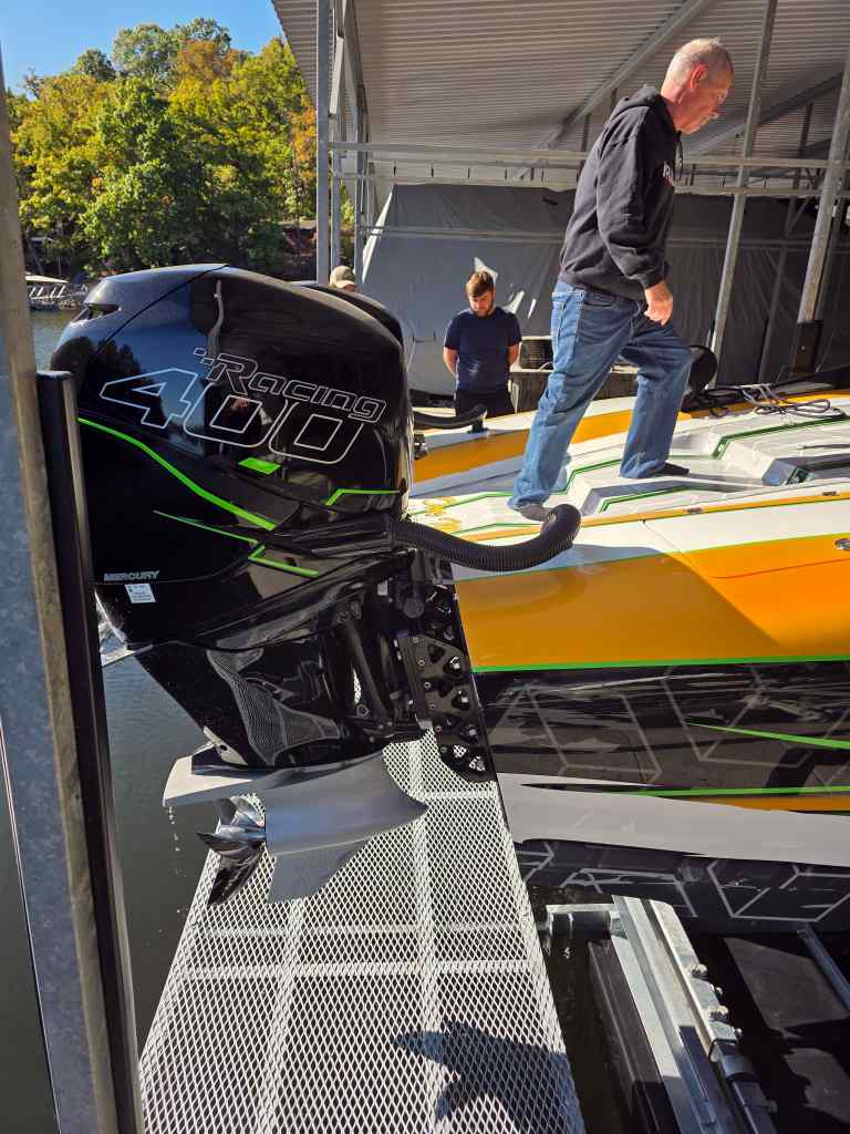 Stern-mounted boat lift walkway gives easy access to your boat motor